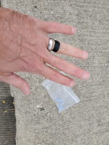 Bicycle Inner tube band slice over the wedding ring or beyond it easily keeps the ring in place, even in the longest coldest swims; when not in use, store it in the same place as ear plugs