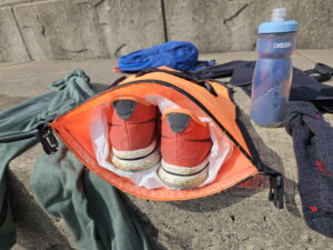 Load the open water swim buoy dry bag with needed items