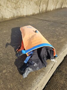 A T-shit fits in the New Waver Open Water Swim buoy