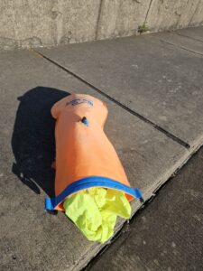 Light weight jacket added to open water swim buoy