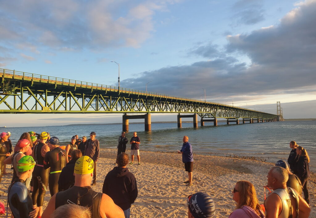 The Mackinac Bridge Swim event leader gives final instructions to the open water swimmers before the start 